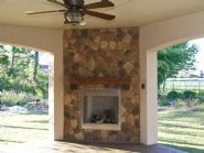 stone exterior fireplace by Acorn Construction - Thumb Pic 26