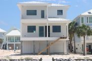 Modern coastal piling home in Navarre by Acorn Fine Homes - Thumb Pic 3
