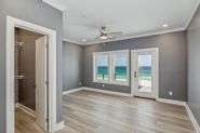 Modern coastal piling home in Navarre by Acorn Fine Homes - Thumb Pic 36