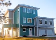 Modern piling home in Navarre, Gulf Breeze, Milton by Acorn Fine Homes - Thumb Pic 1