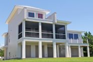 Modern piling home in Navarre by Acorn Fine Homes - Thumb Pic 4