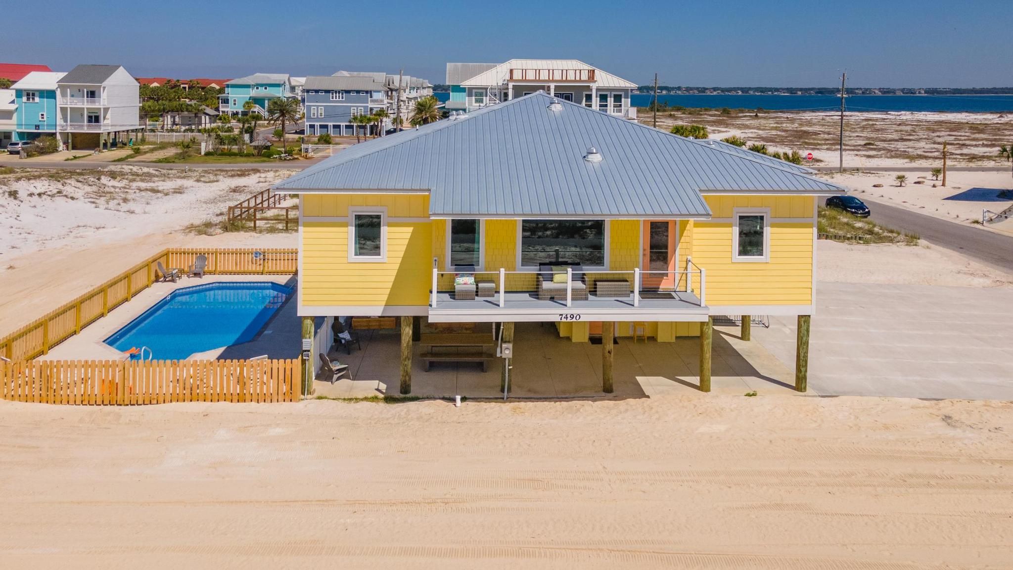 Gomel beach rental piling home on Navarre Beach by Acorn Fine Homes